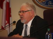 Mayor defends accusation of double-dipping