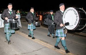 Members of the Renfrew Highland Pipes and Drums lead the parade from St. Michael’s School throughout downtown Douglas and returning to where it began.