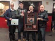 Local awarded plaque for 25 years of service