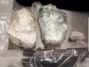 Firearm, drug charges stem from collision investigation